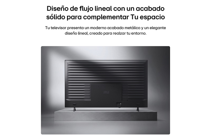 LG QNED AI QNED74 Mini LED is shown from the back, revealing a metallic rear panel with evenly spaced horizontal ridges that create a clean, structured look and emphasize the Linear Flow Design across the entire surface.
